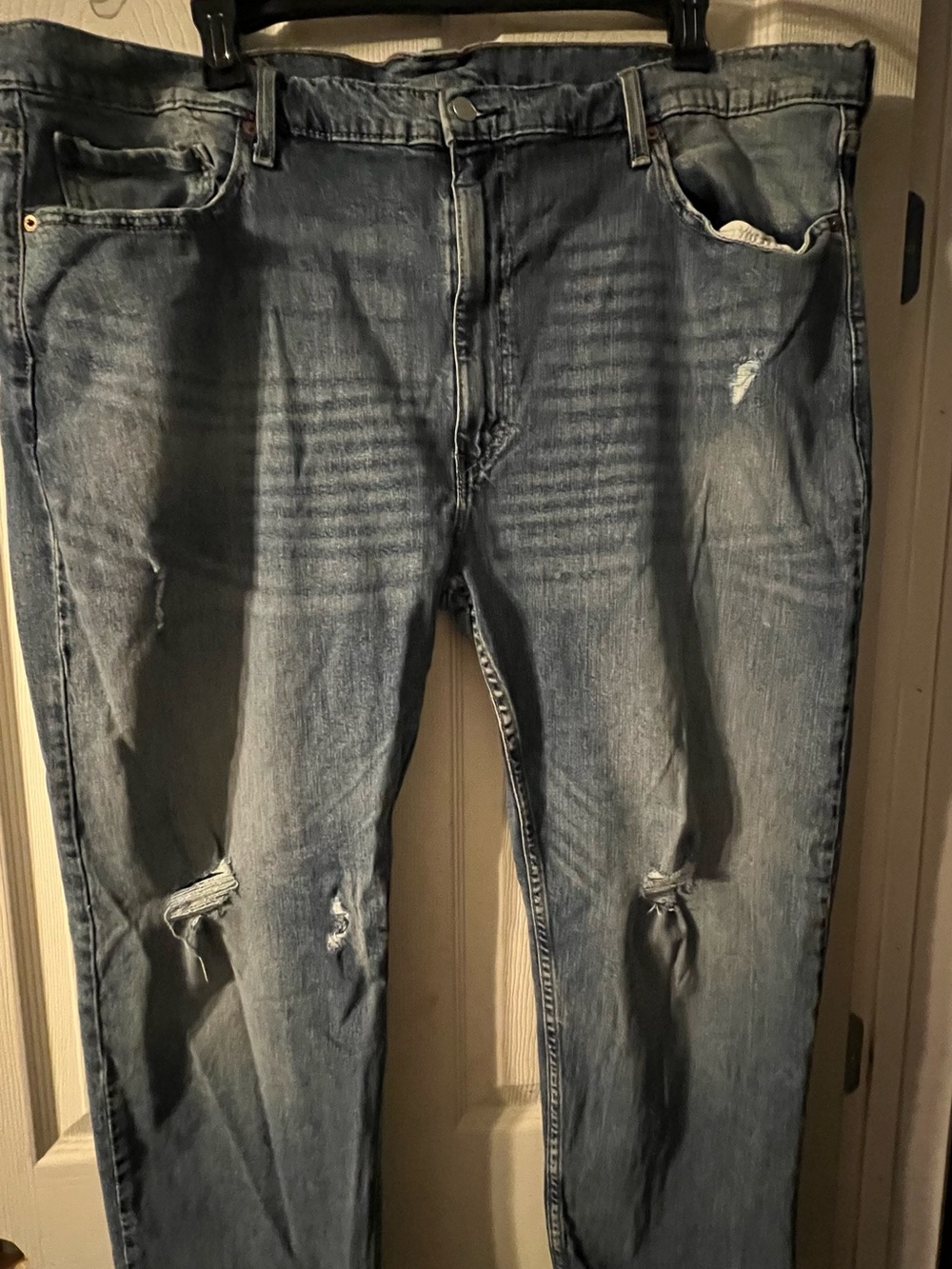 Levi's Light Blue Slim Straight Jeans with Knee Distressing